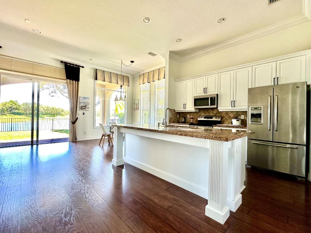 Photo of 8186 NW 105 Lane, Parkland, FL 33076 (MLS # R11121512)