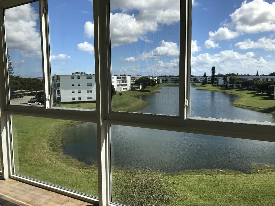 BEST VIEW IN VILLAGE FROM STUNNING ENCLOSED PATIO. NEWER CENTRAL A/C & H2o
CONVENIENT PARKING AND CLOSE TO ELEVATOR.PRISTINE POOLSIDE BUILDING
NEEDS TLC!!!