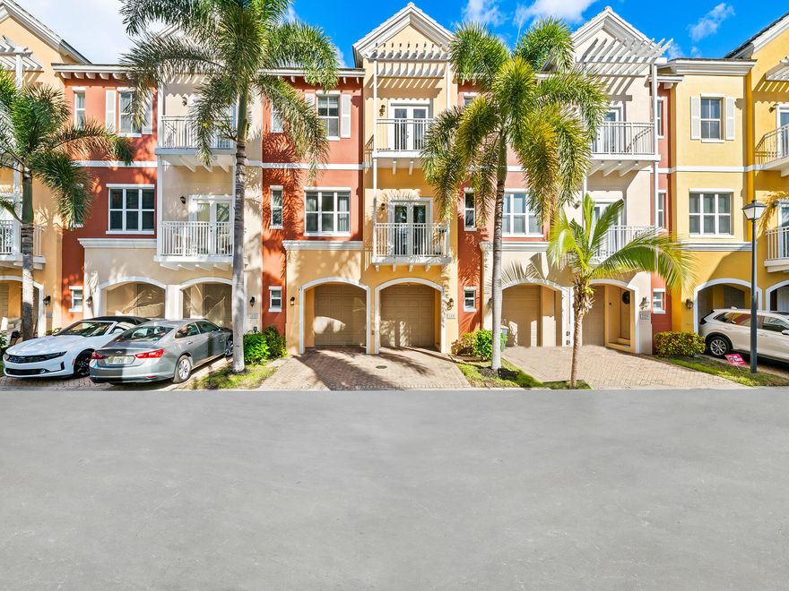 Welcome to Vintage, a gated community of only 80 town homes in Lighthouse Point with a community pool, jacuzzi ! Although it was built in 2007 this 2 bedroom 2.5 bathroom 3 level property has been highly upgraded and features a modern white kitchen with quartz counters, stainless appliances & wine fridge, hurricane impact windows & doors, luxury vinyl flooring throughout, newer A/C, designer lighting and so much more! The two car garage is outfitted with a rubberized floor and insulated garage doors making it perfect for a home gym! Best of all is its location just north of Fort Lauderdale and south of Boca Raton giving you easy access to the best beaches, dining, and entertainment South Florida has to offer!