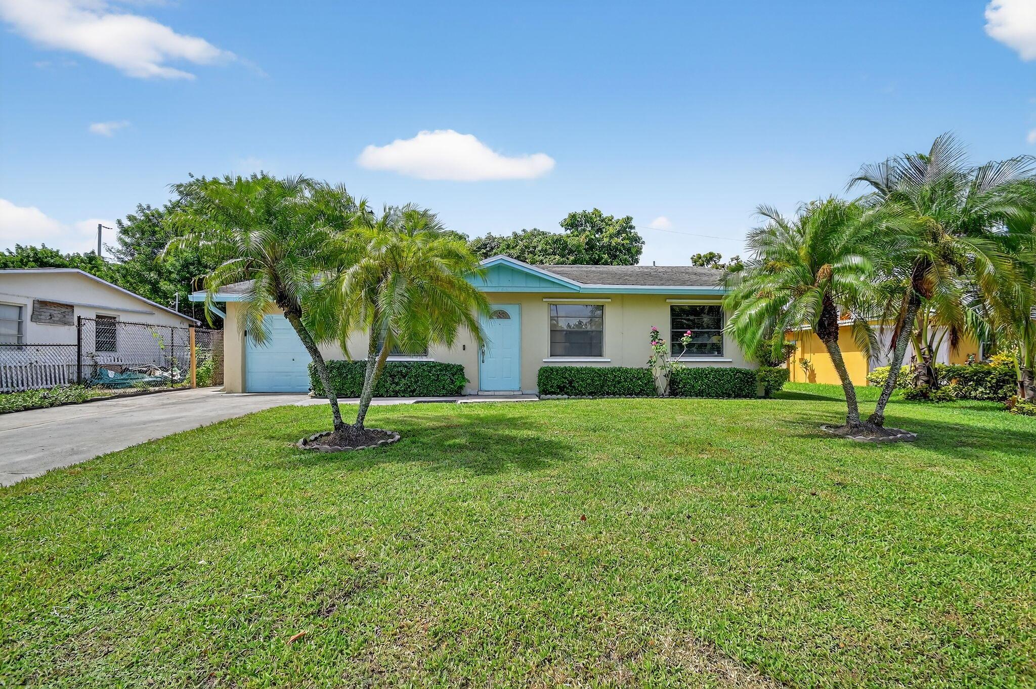 This 3-bedroom, 2-bath home offers a comfortable layout and a large backyard with plenty of space to add a pool. Located in a no HOA community, just 10 minutes from the beach, and close to shopping, dining, and PBI Airport--making it a convenient and flexible place to call home.