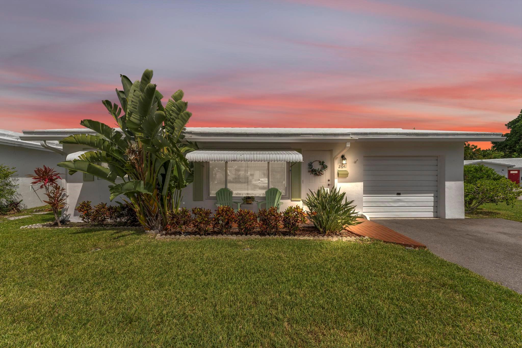Peace of mind comes built- in with this beautifully maintained, 2 bedroom, 2 bath, gem on a huge corner lot in a vibrant 55+ community. Move right in and enjoy the many major updates. Upgraded second bath 2023, new A/C 2022, impact windows 2024 with stylish old Florida charm window awnings. New roof 2019, energy efficient Simpson roof coating 2022, upgraded double driveway leading to your 1 car garage. Relax in the bright Florida room, leading to your private outdoor patio. Take advantage of this active community, golf, 2 pools, clubhouse, classes, shuttle and so much more. Community is centrally located close to all Pompano Beach has to offer, shopping, casino, beach, wonderful dining, Pompano Pier. Community includes painting of house, lawn, landscape, water, so much more
NO LAND LEASE