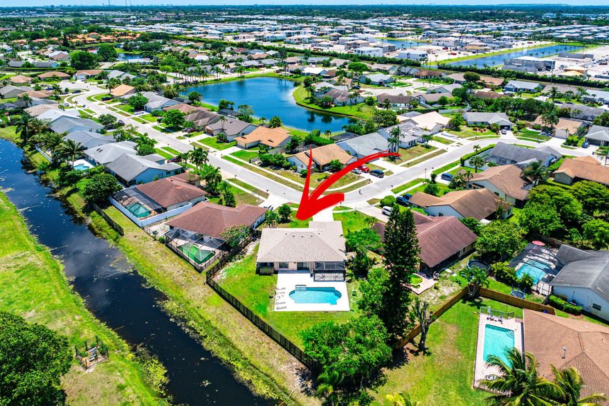 4BR/2.5BA pool home on an oversized 13,000+ SF fully fenced corner lot in the highly sought-after Estate Section of Boca Fontana. This residence offers the perfect balance of privacy, space, and functionality, located within an A-rated school district. The HUGE backyard is designed for entertaining, featuring a screened-in patio, private pool, and expansive outdoor living space. Inside, enjoy volume ceilings, an open-concept split floor plan, and abundant natural light throughout. The spacious primary suite includes a walk-in closet and peaceful backyard views. Additional features include a NEW roof, and accordion shutters on windows for added protection. Ideally located in West Boca Raton between Glades Road and Yamato Road, just minutes from top-tier dining, shopping, and major highways.
