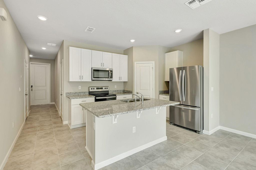 Photo of 5694 SE Edgewater Circle, Stuart, FL 34997 (MLS # R11147079)