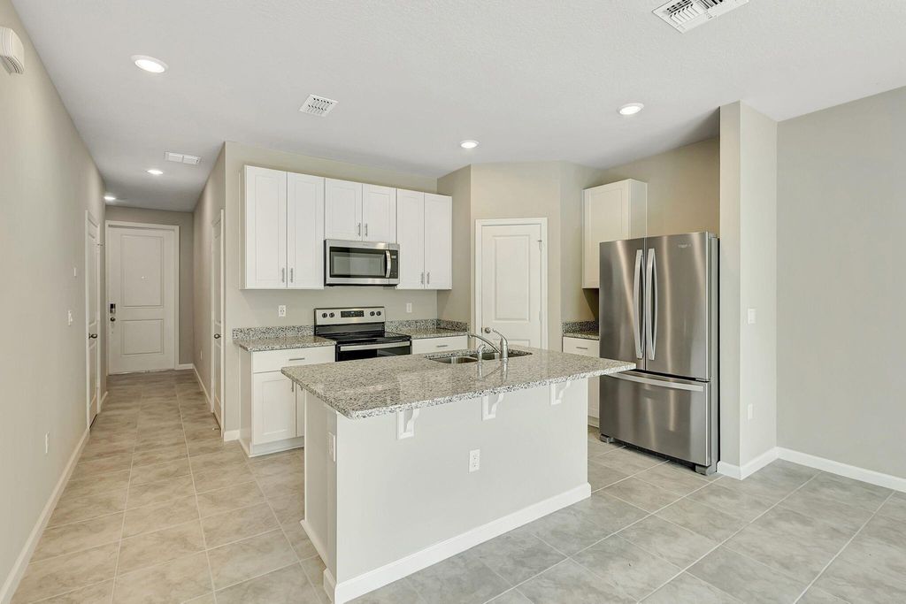 Photo of 5694 SE Edgewater Circle, Stuart, FL 34997 (MLS # R11147079)