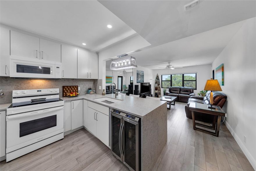 COMPLETELY UPDATED 2BD/2BA condo w/ OVERSIZE BALCONY & CITY/CANAL VIEWS!!! Welcome to the NEW & IMPROVED, 22-acre, GATED ISLAND OASIS of RIVER REACH—a boater's paradise w/ 3000' of open access dockage & no fixed bridges! Amenities include GUARDED ENTRY, 24-hour security, HUGE CLUBHOUSE, 3 heated pools, 2 tennis courts, exercise room, bike & kayak storage & AFFORDABLE DOCKAGE up to 50 ft (on availability). Major Exterior Maintenance Project JUST COMPLETED!!! New balcony railings & all common areas updated (inc. pools, clubhouse, gate, landscaping, etc.) NEW KITCHEN, BATHS, IMPACT GLASS, LAMINATE FLOORING, ETC. WASHER & DRYER HOOK UP INSIDE UNIT! Water, basic cable & Internet included in Dues. Pet friendly. Close to Downtown, Las Olas Blvd, airport, shops & restaurants. Don't Miss this one!  SHOWING INSTRUCTIONS: PLEASE USE SHOWING TIME FOR SCHEDULING APPOINTMENTS. All assessments paid by Seller. All concrete restoration 40/50 years cert. and reserve requirements have been completed. Leasing after 2 years owned. (2) pets up to 30 lbs. each. Dockage up to 50' at $48/ft/year w/ no fixed bridges (on availability). Storage unit included. Washer/Dryer hook-up already in unit. $2400/HOA paid quarterly. (1) assigned spot & (1) guest spot included. All information believed accurate but not guaranteed. Proof of funds/pre-approval required with all offers.