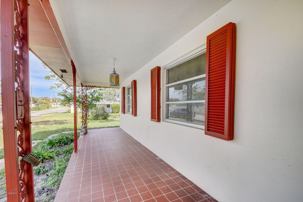 Photo of 815 Worthmore Drive, Lake Worth Beach, FL 33460 (MLS # R10974379)