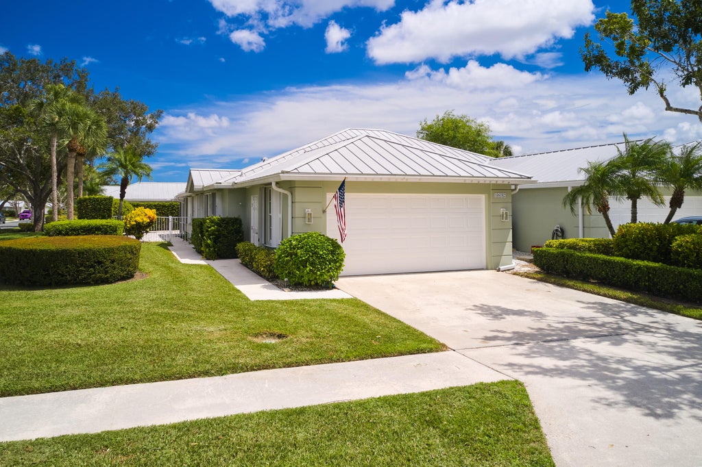 Photo of 1632 SW Waterfall Boulevard, Palm City, FL 34990 (MLS # B26074958)