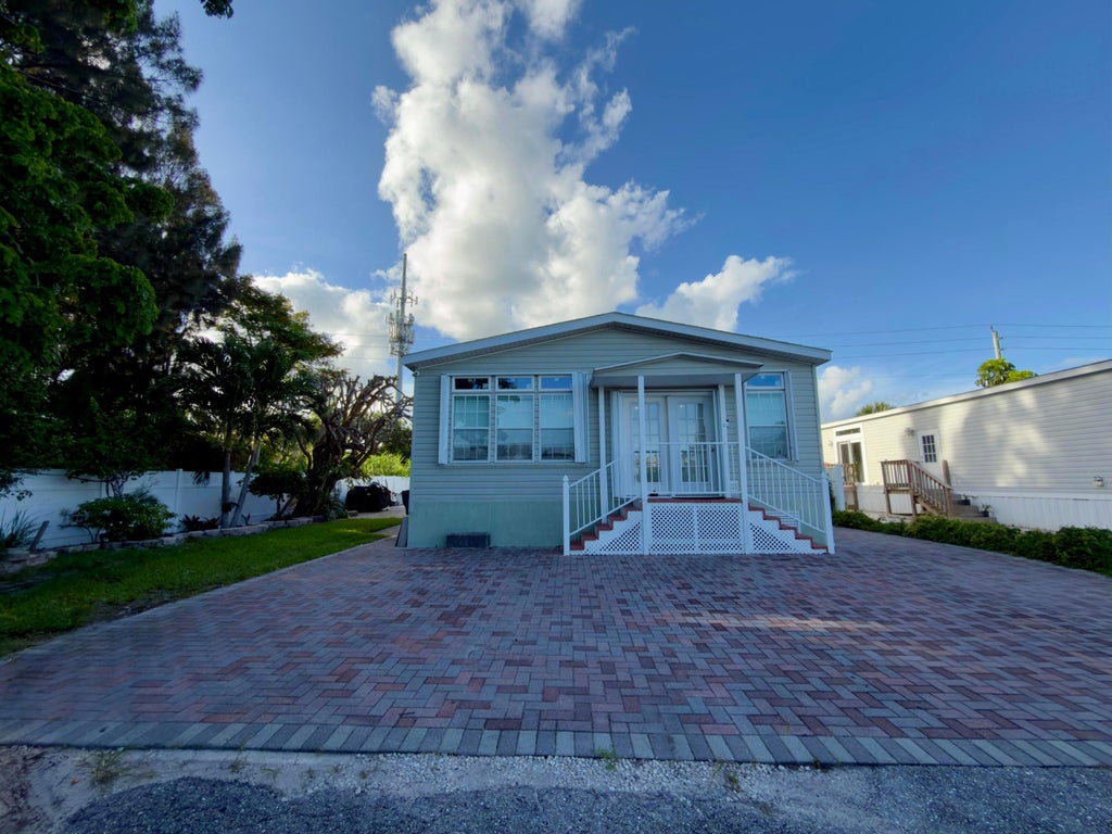 Photo of 4311 Okeechobee Boulevard #95, West Palm Beach, FL 33409 (MLS # B26038004)