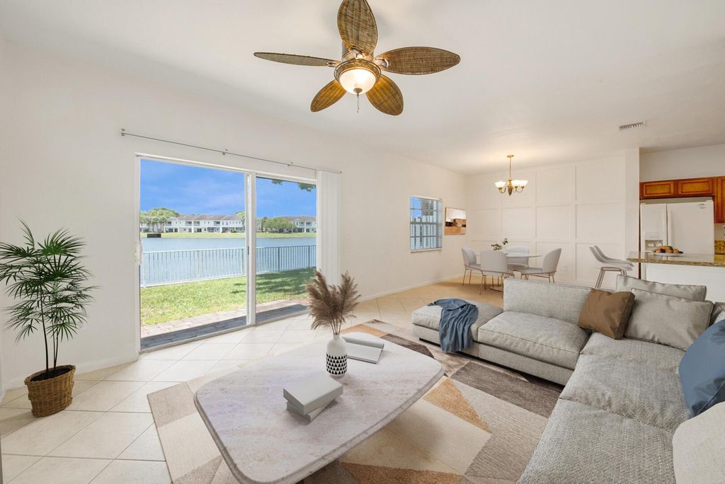 Photo of 4102 Emerald Vis, Lake Worth, FL 33461 (MLS # R11101861)