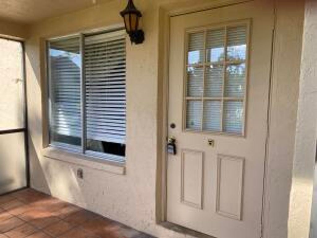 Photo of 446 Pine Glen Lane #A-1, Greenacres, FL 33463 (MLS # B26013737)