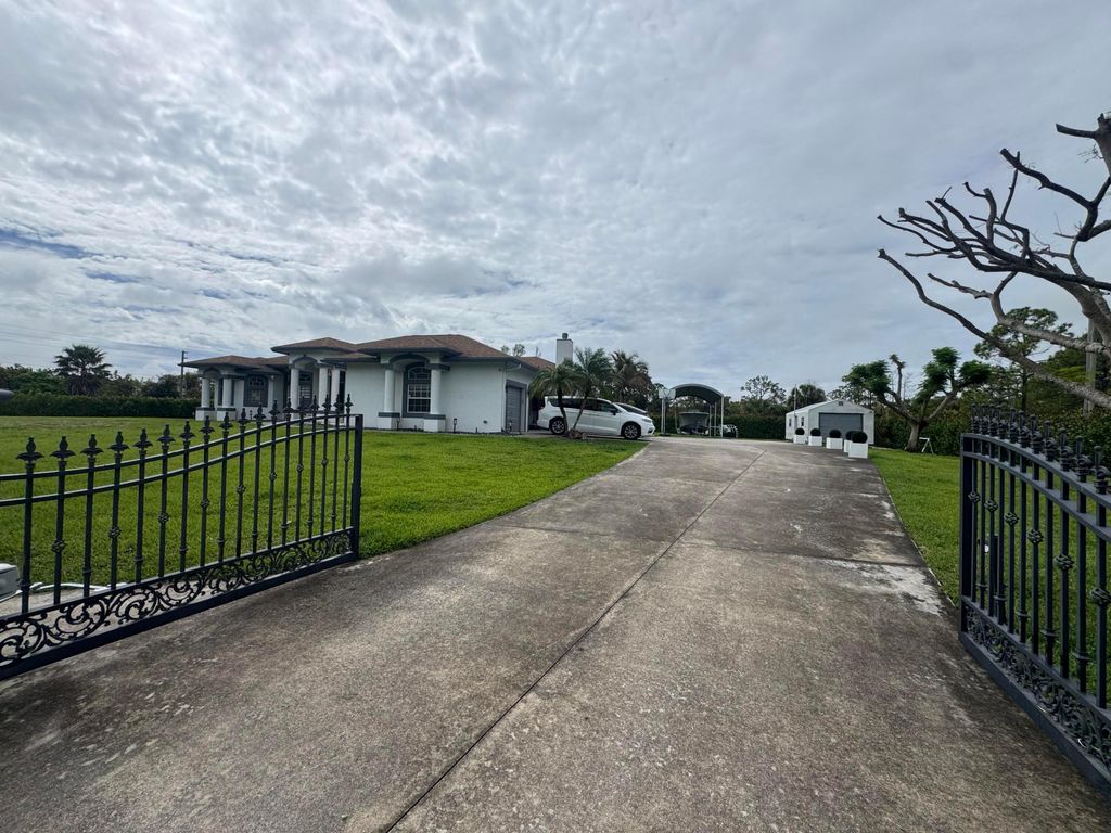 Photo of 15062 N 73rd St Street N, The Acreage, FL 33470 (MLS # B26015964)