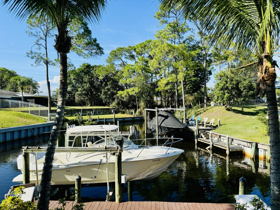 Photo of 3059 SW Woodland Trail, Palm City, FL 34990 (MLS # R10939679)