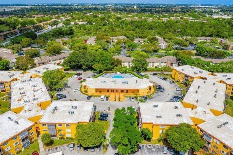 Bright & Spacious 1 Bed, 1.5 Bath Condo. Prime Location, Excellent Investment. Welcome to this beautifully maintained 1 bed, 1.5 bath condo, offering a bright and spacious layout with tile and laminate flooring throughout. Located in a well-kept, pet-friendly community with easy access to highways, shopping, restaurants, and just a short drive to Boca Raton, Fort Lauderdale, and the beach, this unit is perfect for homeowners and investors alike. The property features ample closet space, including a large walk-in closet, and a screened-in balcony ideal for relaxing in privacy. Great amenities like a pool, gym, and sauna. Currently rented until March 31, 2026, at $1,450 per month.