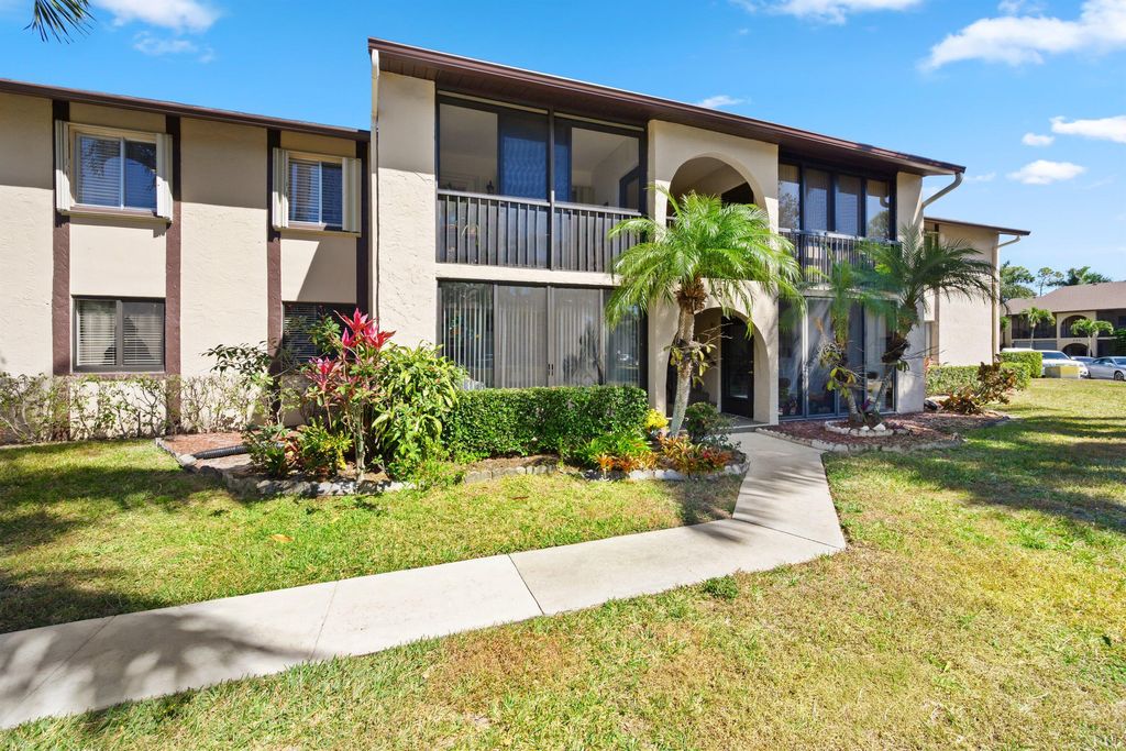 Photo of 431 Pine Glen Lane #C-2, Greenacres, FL 33463 (MLS # R11168976)
