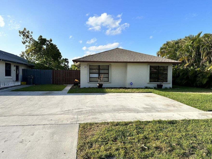 Beautiful 3 bedroom home has tile throughout the house, eat in kitchen, large great room with vaulted ceilings, screened patio with very private fenced backyard, spacious bedrooms and closets, laundry room, extra storage, etc. This is a must see!! Well kept community has tennis & pool & racquetball & is centrally located. Very close to just about everything. 15 min from beach, downtown City Place & Wellington. Zoned for a fantastic magnet school for science, Pine Jog Elementary!