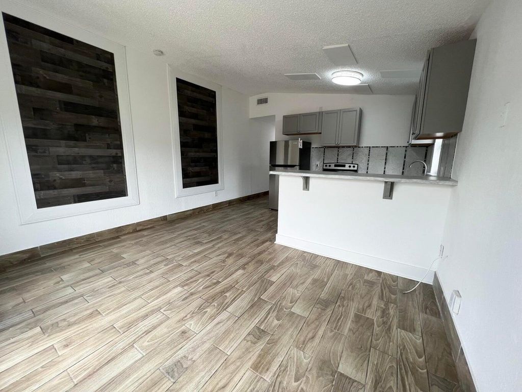 Photo of 1050 W 7th Street, Riviera Beach, FL 33404 (MLS # R11147971)