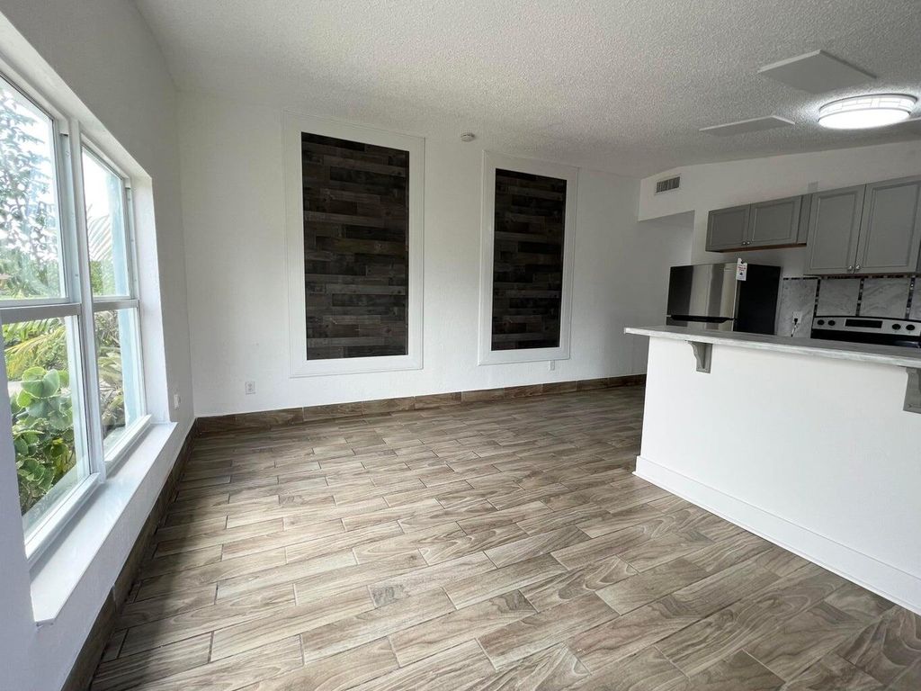 Photo of 1050 W 7th Street, Riviera Beach, FL 33404 (MLS # R11147971)