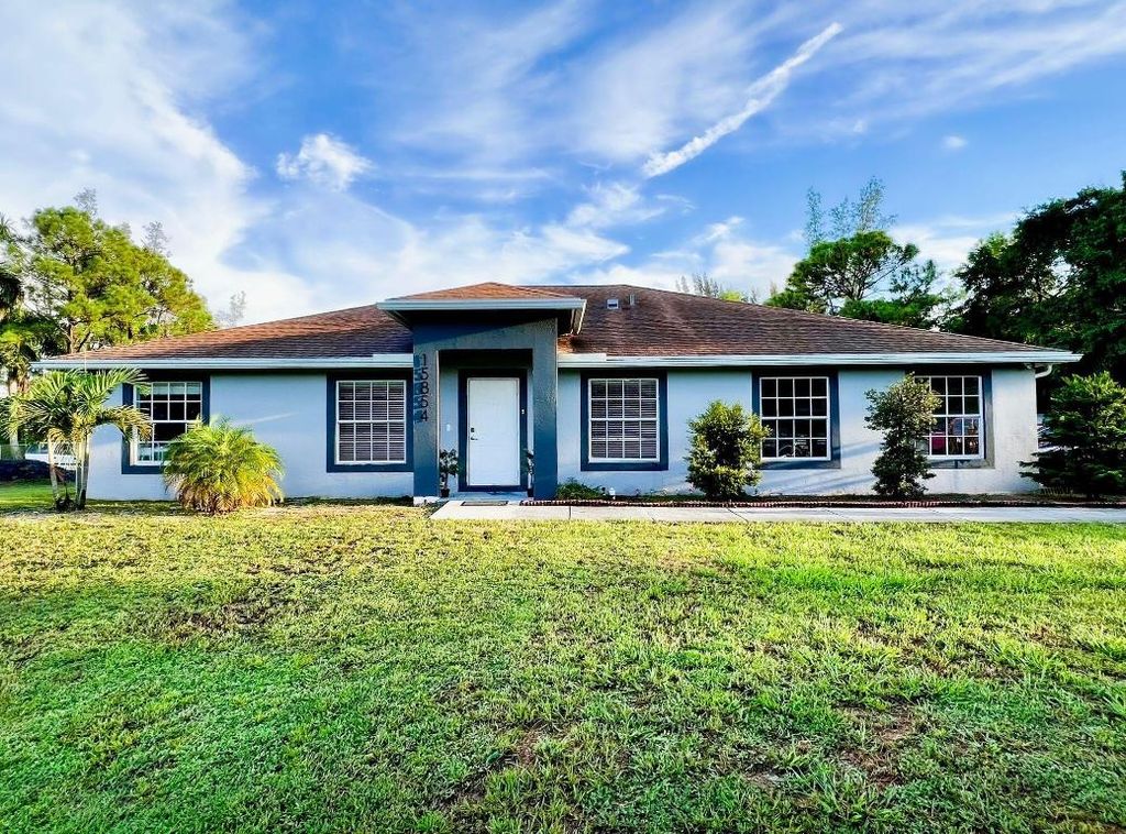 Photo of 15854 92nd Court N, The Acreage, FL 33412 (MLS # R11120883)