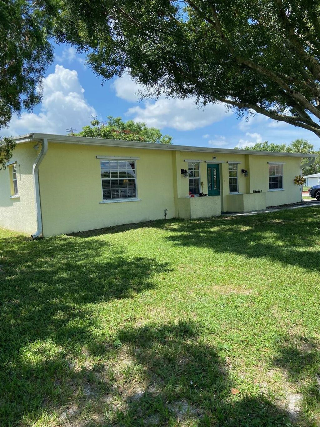 Photo of 102 NE Jardain Road, Port St Lucie, FL 34983 (MLS # R10905093)