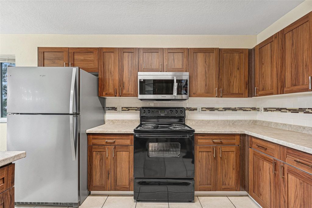 Photo of 8466 NW 40th Street, Coral Springs, FL 33065 (MLS # F10545963)