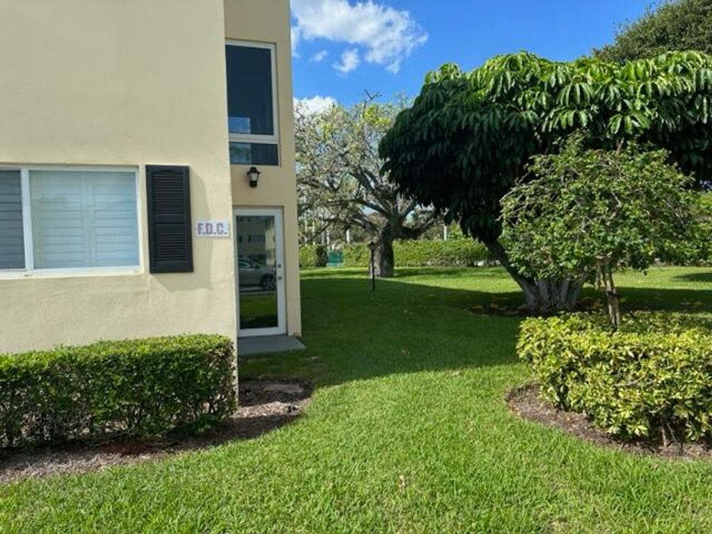 Photo of 12 Colonial Club Drive #105, Boynton Beach, FL 33435 (MLS # R10918007)