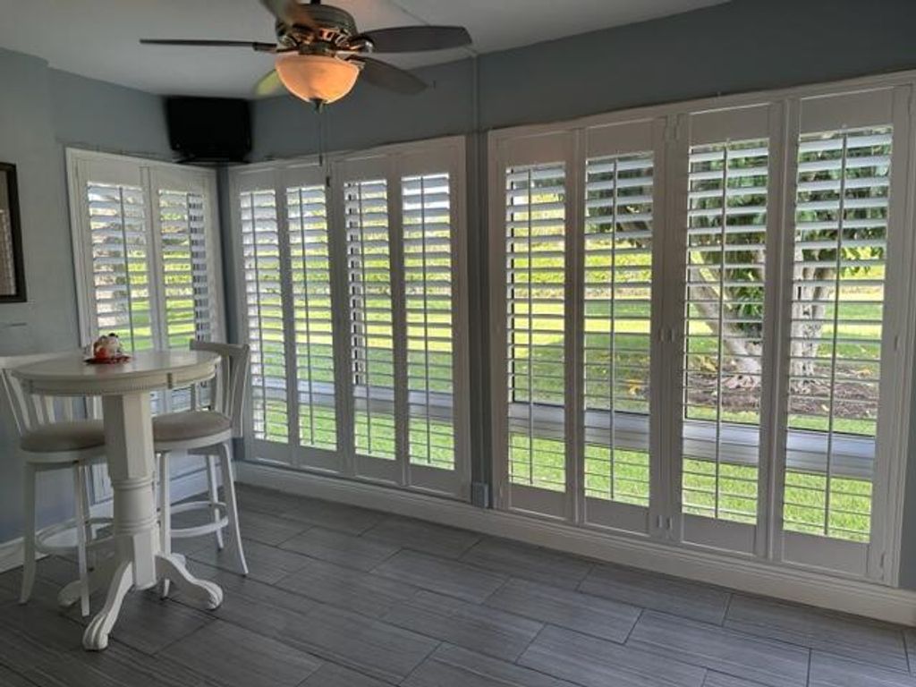 Photo of 12 Colonial Club Drive #105, Boynton Beach, FL 33435 (MLS # R10918007)