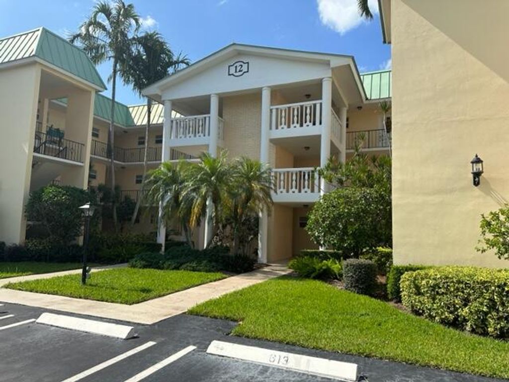 Photo of 12 Colonial Club Drive #105, Boynton Beach, FL 33435 (MLS # R10918007)