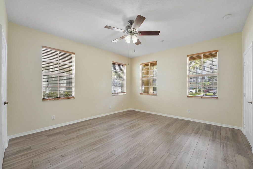 Photo of 128 W Royal Palm Circle #105, Jupiter, FL 33458 (MLS # R11119942)