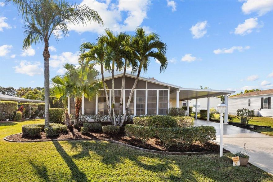 Charming Beachcomber model offering 2 spacious bedrooms, 2 baths, a formal dining room along with an eat in kitchen breakfast nook and a 27' enclosed lanai with North East exposure for year round living. Home features plantation shutters, wood laminate and tile throughout, oversized shed, decor drive and cost saver irrigation well.   You're sure to love all the fun and sun in the amenity packed Savanna Club 55+ community and the convenient access to beaches, shopping, restaurants and medical. Land Lease Property -Buyer to verify all information.