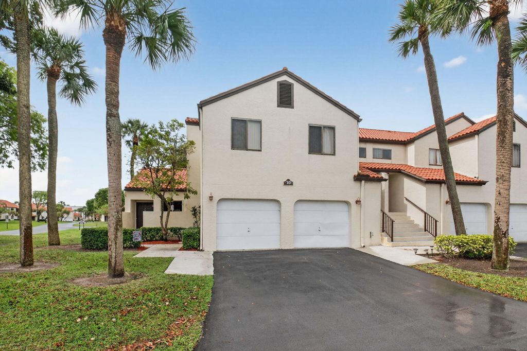 Photo of 10 VÃ­a De Casas Sur #101, Boynton Beach, FL 33426 (MLS # B26013537)