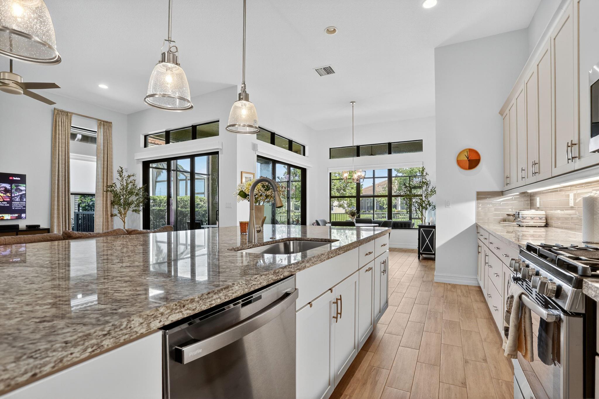 *Make an Offer* Beautiful 3-bedroom Cerelia model with a bright flex room (4th bedroom) and 2 bathrooms in the vibrant 55+ community of Four Seasons. Built in 2020, it offers serene lake views with no houses across the street. The open floor plan features high ceilings and a spacious Great Room with a large island and granite countertops. Enjoy an oversized fenced backyard, a screened patio, a generator, wood-look tile flooring, a freshly repainted interior, custom closets in the master suite, and an air-conditioned garage. Engage in a variety of activities every day, including comedy shows, concerts, talent shows, bingo nights, paint & sips, movies, pickleball, tennis, billiards, and more! Explore the café, card room, gym, pool, and a wide range of clubs tailored to your interests.