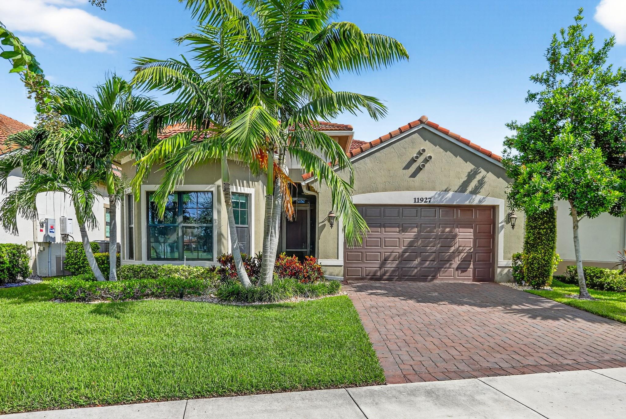 **Looking to move closer to family or downsize in an active 55+ community? Your search ends here!** Discover this stunning 3-bedroom home with a bright flex room/4th bedroom and 2 bathrooms in Four Seasons, a vibrant 55+ community in Parkland, FL. Built in 2020, this home features peaceful lake views in the front and back, and an open floor plan with high ceilings. Enjoy an oversized fenced backyard, a screened patio, a generator, and a Great Room with a large island and granite countertops. Additional highlights include wood-look tile flooring, a freshly repainted interior, two custom closets in the master suite, and an air-conditioned garage. This beautiful residence is ready for you to enjoy all the amenities of Four Seasons Parkland. No house across the street! Don’t miss your chance!