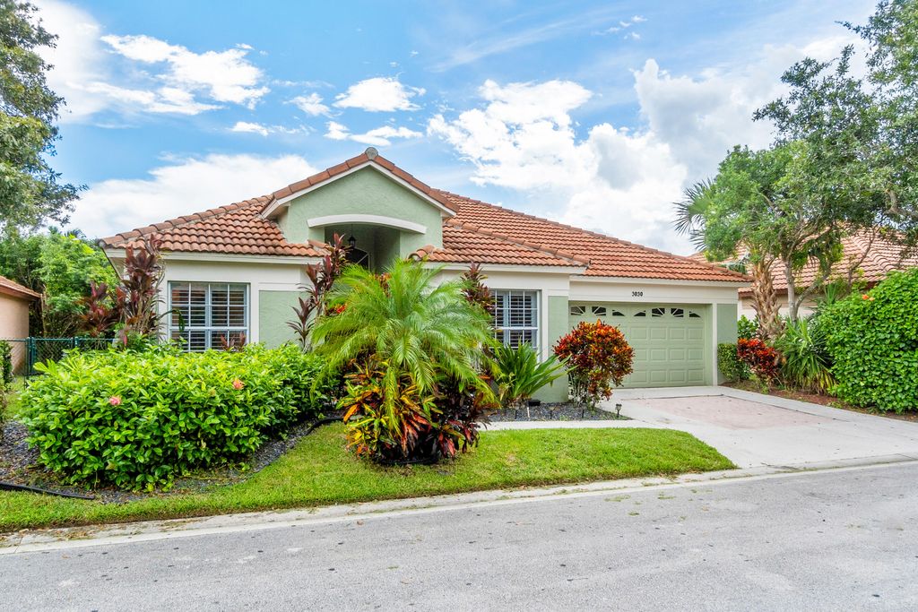 Photo of 3030 Casa Rio Court, Riviera Beach, FL 33418 (MLS # R11061336)