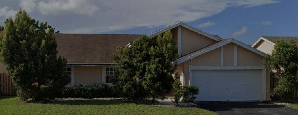 Photo of 8511 NW 52nd Court, Lauderhill, FL 33351 (MLS # B26068328)