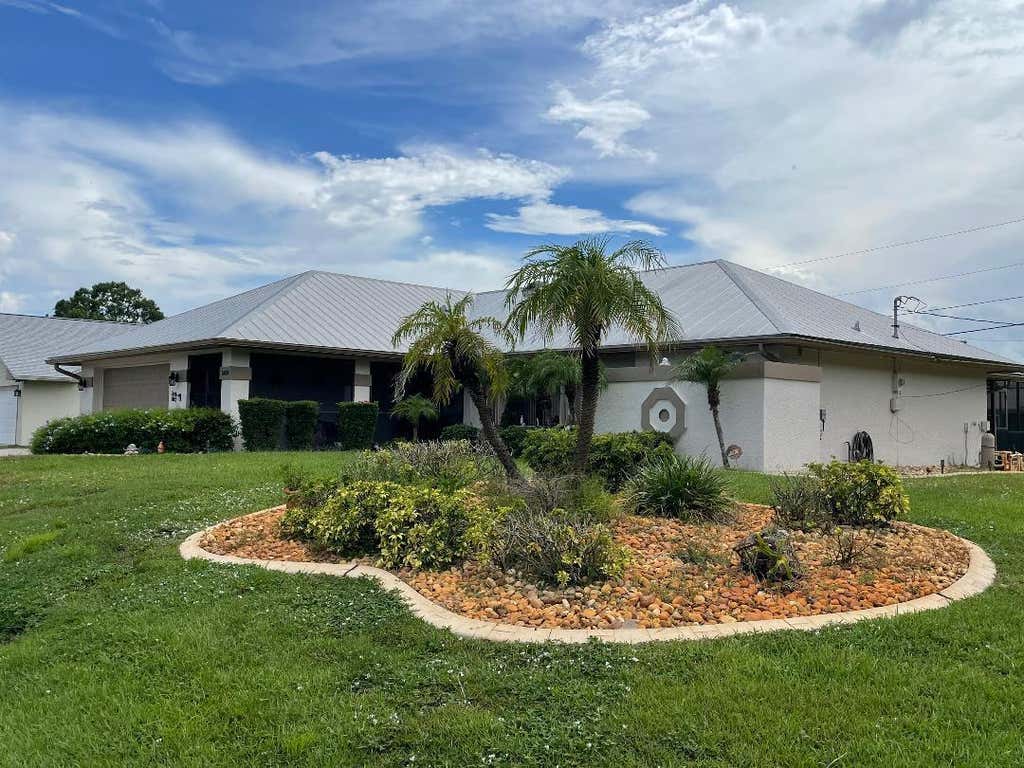 Photo of 6409 NW FRIENDLY Circle, Port Saint Lucie, FL 34983 (MLS # B26058115)