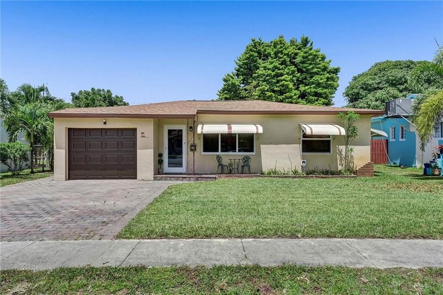 Beautifully remodeled East Dania Beach home featuring 2 bedrooms, 2 bathrooms, garage, new roof, impact windows & doors, large kitchen with wood cabinets, newer Whirlpool stainless steel appliances, designer granite kitchen counter tops with breakfast counter, crown moldings, upgraded electric, tile floors, huge screened in back patio with insulated roof, very large open fenced backyard, separate utility room with Samsung Washer/Dryer, renovated master bedroom and bathroom with glass walk in shower & separate corner oversized jacuzzi tub, Pulsar 10KW Portable Generator, Tankless Hot Water Heater, paver front driveway, back patio and sidewalks, built in back yard bar and grill, nicely landscaped to live in paradise. A MUST SEE! WONT LAST! Beautifully remodeled East Dania Beach home on large lot featuring 2 bedrooms, 2 bathrooms, one car garage, new roof, impact windows & doors, large kitchen with wood cabinets, newer Whirlpool stainless steel appliances, granite counter tops, breakfast counter for stools, crown moldings, upgraded electric, tile floors, huge screened in back patio with insulated roof, very large open and fenced backyard, separate utility room with Samsung Washer/Dryer, renovated master bedroom and bathroom with glass walk in shower and separate corner oversized jacuzzi tub, Pulsar 10KW Portable Generator, Tankless Hot Water Heater, paver front driveway, paver back yard patio areas and sidewalks, built in back yard bar and grill, nicely landscaped to live in paradise. A MUST SEE! WONT LAST!