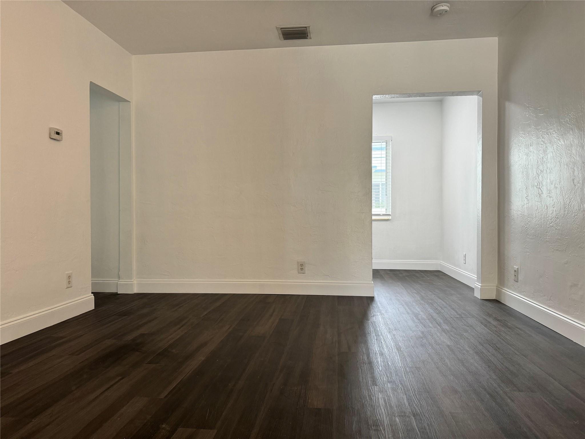 MOVE-IN SPECIAL, FIRST MO & SECURITY! Charming 2 Bed, 1 Bath Apt in Hollywood, FL – Minutes from Downtown! Welcome to this cozy and newly renovated two-bedroom, one-bathroom apartment located in the heart of Hollywood, Florida. Perfectly situated near downtown, this apartment offers convenience and comfort with easy access to all the local amenities. Step into a spacious living area featuring beautiful modern flooring, fresh paint, and plenty of natural light throughout. The newly updated kitchen comes equipped with white shaker cabinets, sleek countertops, and ample storage space, perfect for any home chef. Both bedrooms are generously sized, offering plenty of closet space and large windows for a bright and airy feel. The bathroom has been tastefully updated for a modern touch.