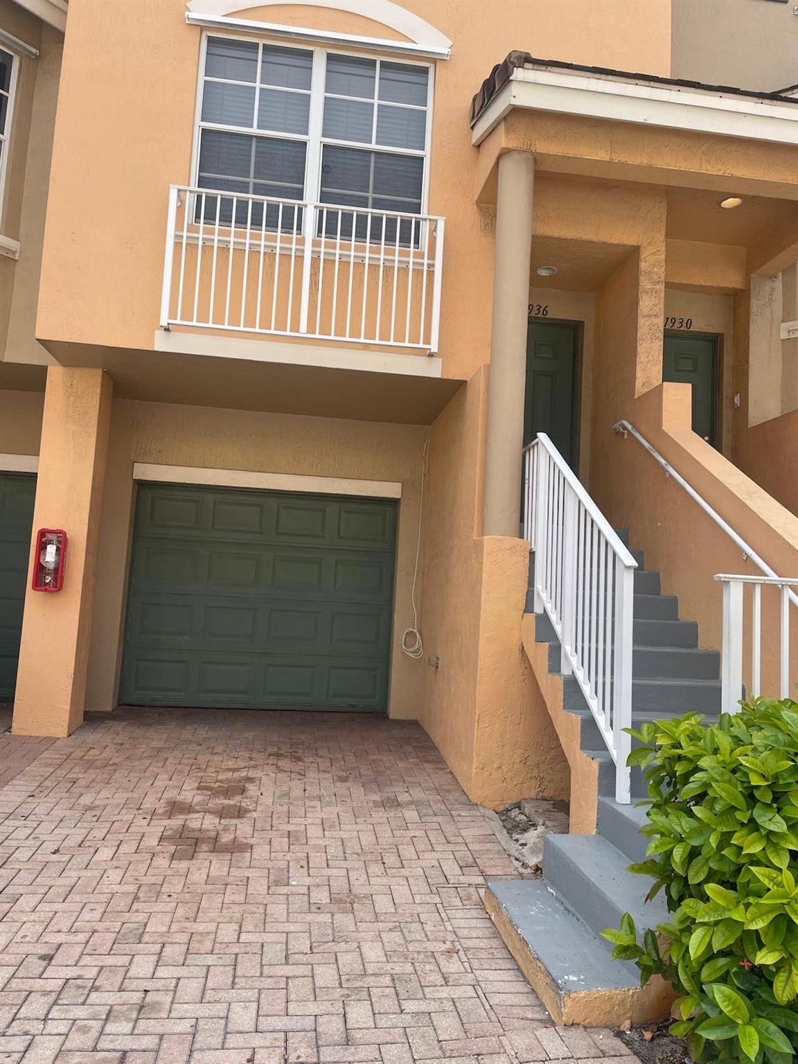Available now for annual lease. No Minimum Credit Score Required! This beautiful and spacious gated 3-bedroom, 3-bathroom townhouse with a garage in Boynton Beach offers a fantastic living opportunity. Each bedroom feels like its own master suite, complete with a full bathroom—perfect for privacy and comfort. All ages are welcome in this pet-friendly home that includes two parking spots, a full-size washer and dryer, tile flooring in the main areas, and laminate in the bedrooms. Water is included in the rent, making it a great value. Situated in a prime location close to public transit, dining, shopping, and local attractions, this townhouse is ideal for convenient South Florida living. To move in, only the first month's rent and a security deposit are required.
