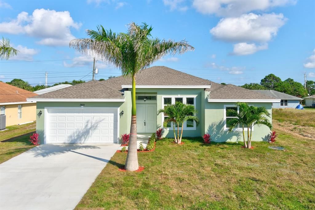 Photo of 3461 SW Haines Street, Port Saint Lucie, FL 34953 (MLS # R10757882)