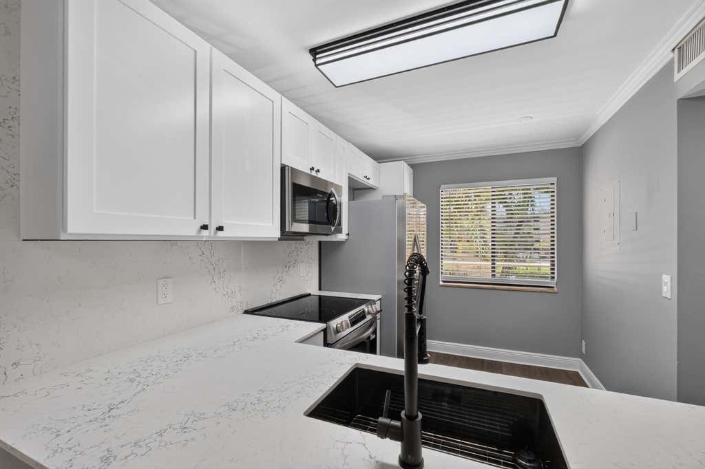 Photo of 6935 Huntington Ln #207, Delray Beach, FL 33446 (MLS # B26056525)