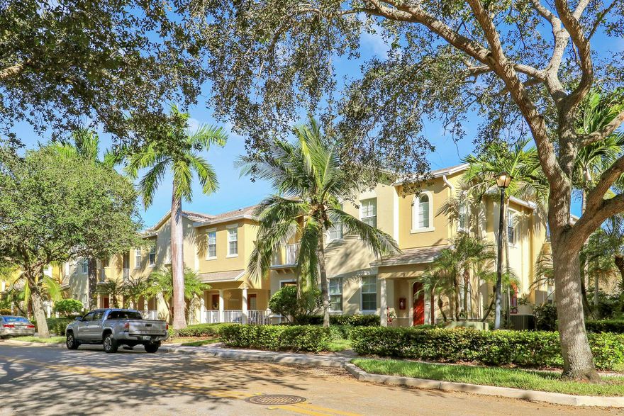 This unit is truly move-in ready at Sandpiper Cove at Botanica! Discover a beautifully maintained 3-bedroom, 2.5-bathroom home at 121 Seagrape Drive, Unit 102, Jupiter, FL, offering 1,843 square feet of inviting living space. This spacious 2-story unit is filled with natural light, creating a warm and welcoming atmosphere. Walk into a tiled main floor featuring a living room, dining room, and a kitchen with granite countertops, stainless appliances and a cozy eat-in area. Step outside onto a large, covered front patio perfect for enjoying the shade.Upstairs, you'll find the carpeted bedrooms, including a primary suite with a generous walk-in closet, a bathroom with a separate shower and tub, and a double vanity. A convenient laundry closet is also located upstairs. The home comes