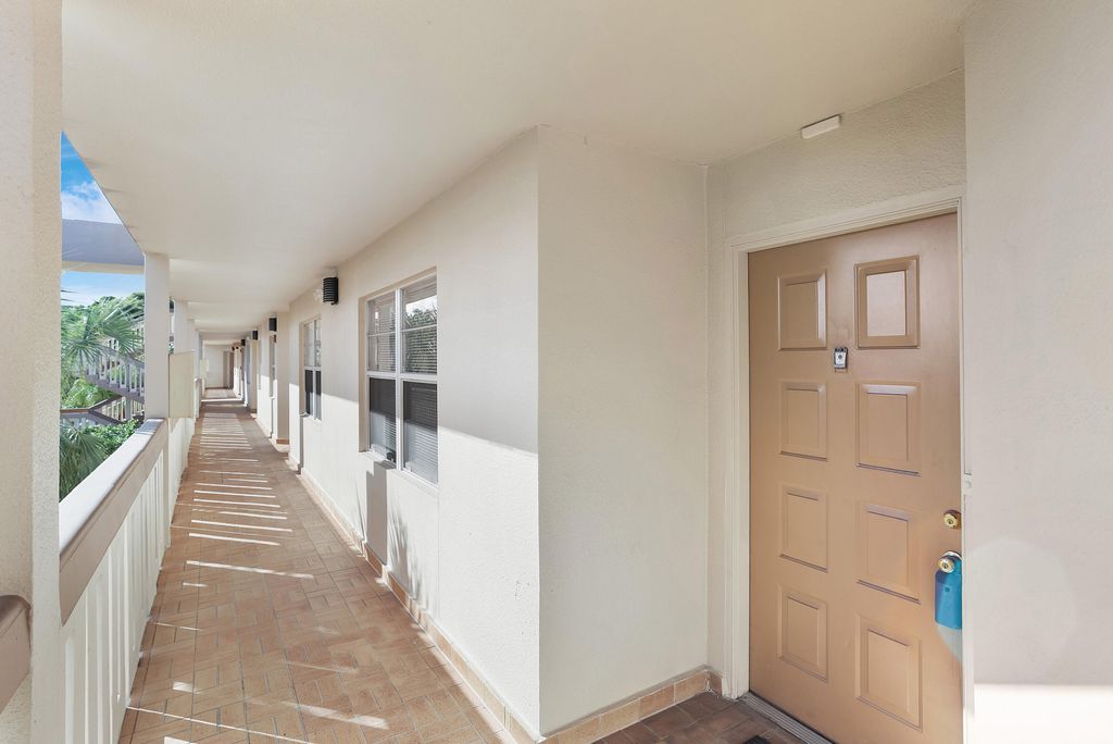 Photo of 1606 Abaco Drive #E3, Coconut Creek, FL 33066 (MLS # R11153774)