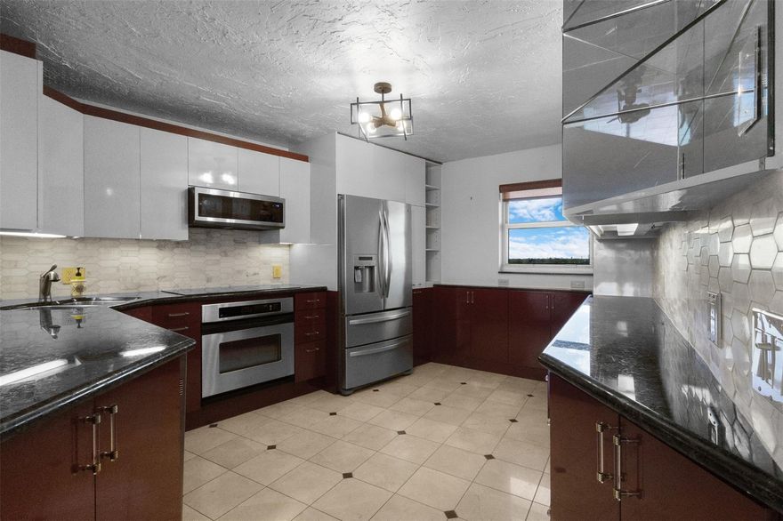 This is three bedroom and two and a half bath end unit on the 7th floor in Hillsboro Cove. This condo boasts the best views in the complex. Beautiful views of the lagoon and intracoastal. Marble and solid teak flooring throughout.  A double sized storage directly next to the unit. Washer and dryer in the unit. Built in safe. One covered parking space. Concrete restoration completed in 2025. No Assessments. Boat slips available on a waitlist for a low fee. Clubhouse, Pool, Sauna, fitness center, cable and internet, and many other amenities. Directly across from the Cove with many shops, bars, and restaurants. Short walk to the beach. Some seller financing available.