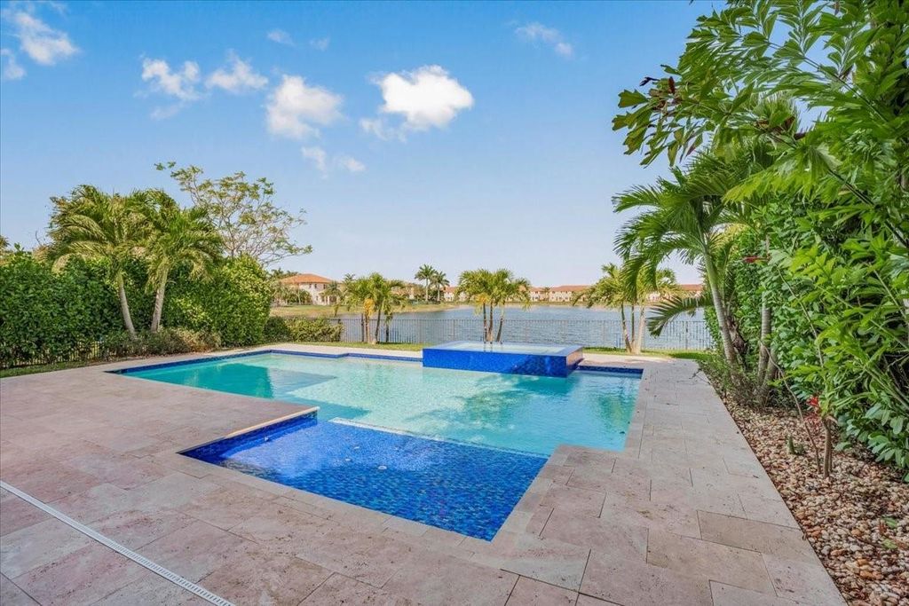 Photo of 9800 S Miralago Way, Parkland, FL 33076 (MLS # F10498914)