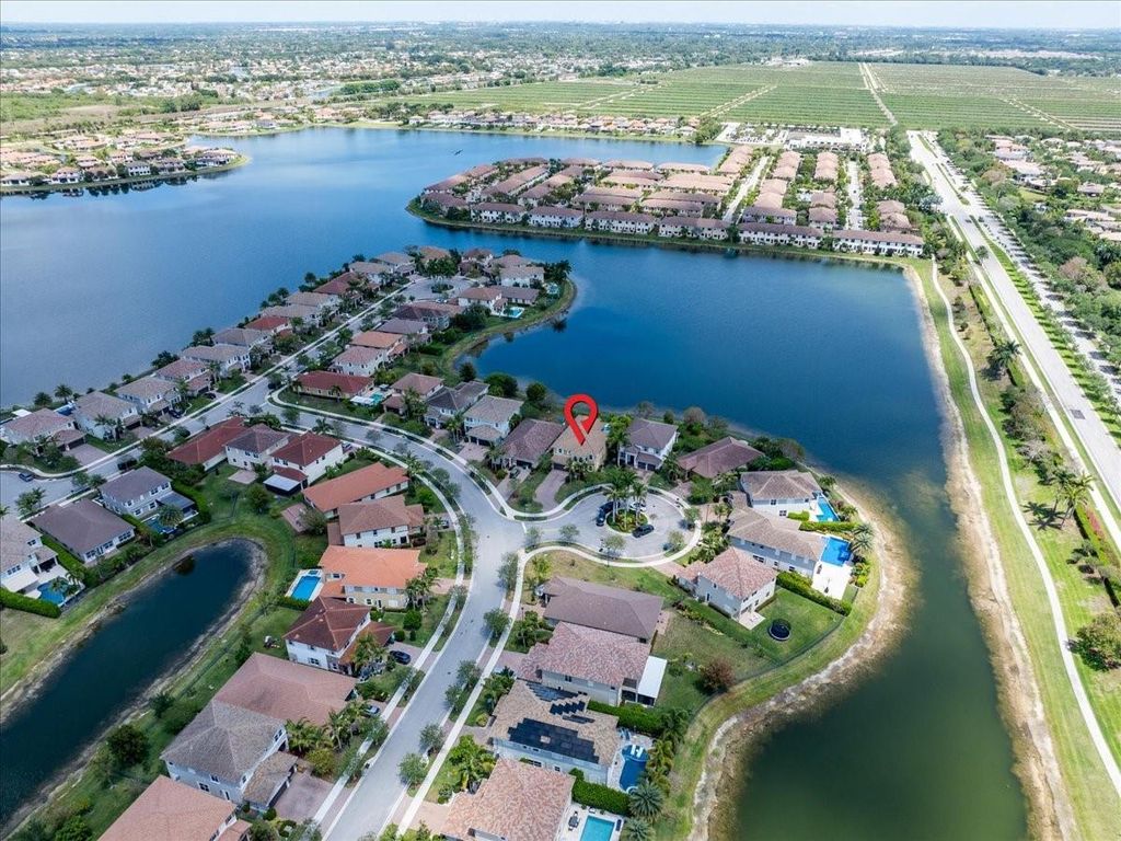 Photo of 9800 S Miralago Way, Parkland, FL 33076 (MLS # F10498914)