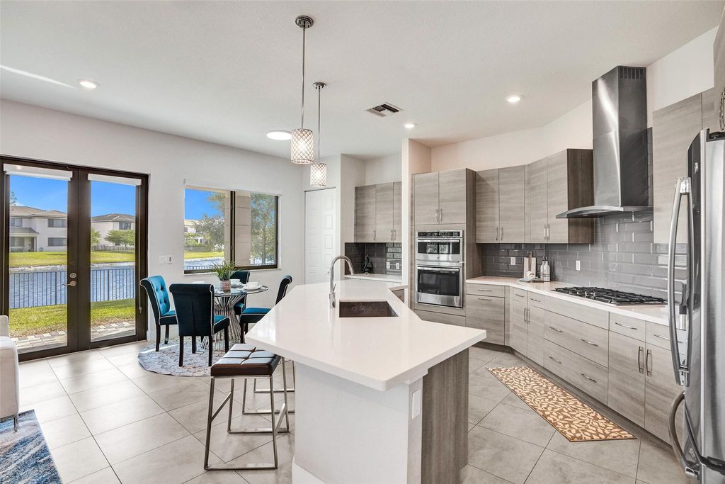 Photo of 10480 Waves Way, Parkland, FL 33076 (MLS # F10507184)