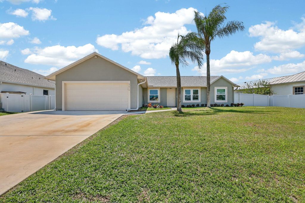 Photo of 2672 SW Import Drive, Port Saint Lucie, FL 34987 (MLS # B26007894)