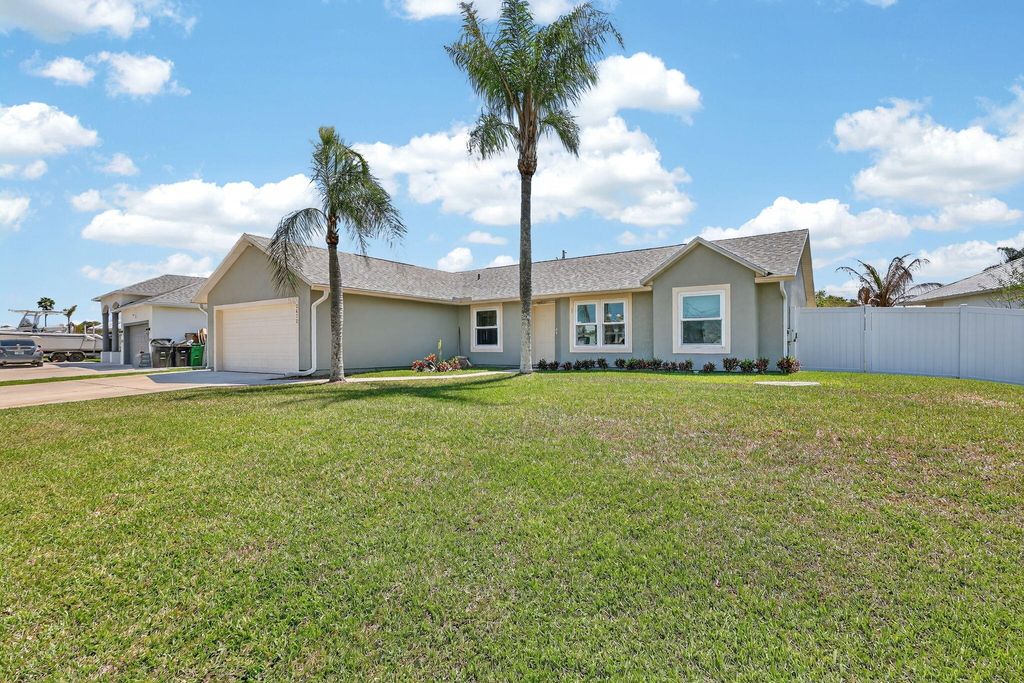 Photo of 2672 SW Import Drive, Port Saint Lucie, FL 34987 (MLS # B26007894)