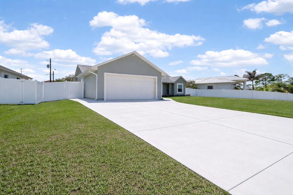 Photo of 2672 SW Import Drive, Port Saint Lucie, FL 34987 (MLS # B26007894)