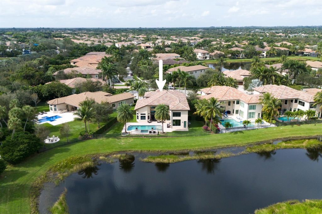 Photo of 8325 Hawks Gully Avenue, Delray Beach, FL 33446 (MLS # R10941429)